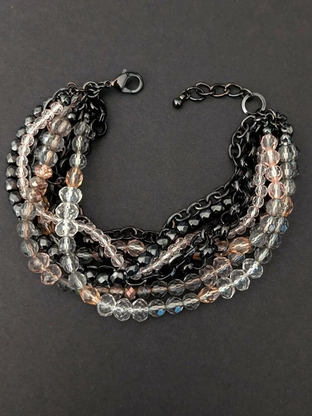Multi strand chain and bead bracelet